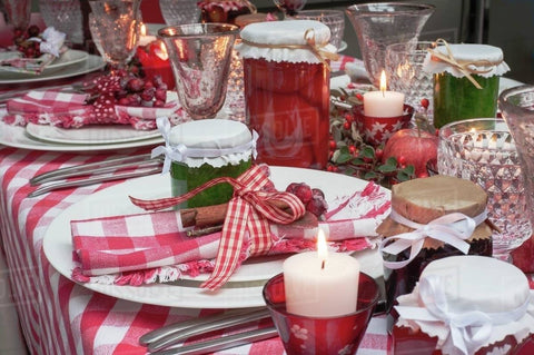 red and green holiday setting with poly check tablecloth