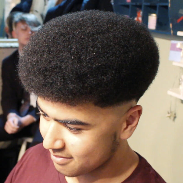 taper haircut with afro