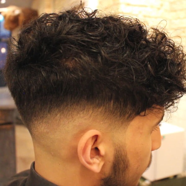 Low Skin Fade Curly Haircut With Disconnected Undercut - VIDEO