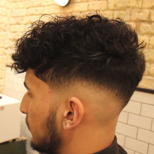 Low Skin Fade Curly Haircut With Disconnected Undercut - VIDEO