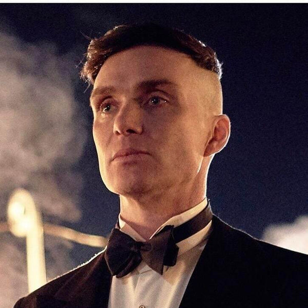 a cat in a suit with a thomas shelby haircut drinking whisky in ... -  Arthub.ai