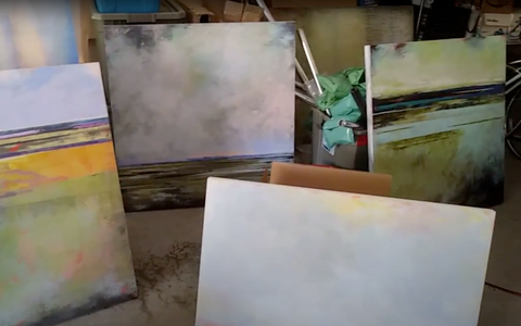 Paintings leaning on stuff