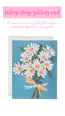 blue card with white and yellow daisies illustrated greeting card 