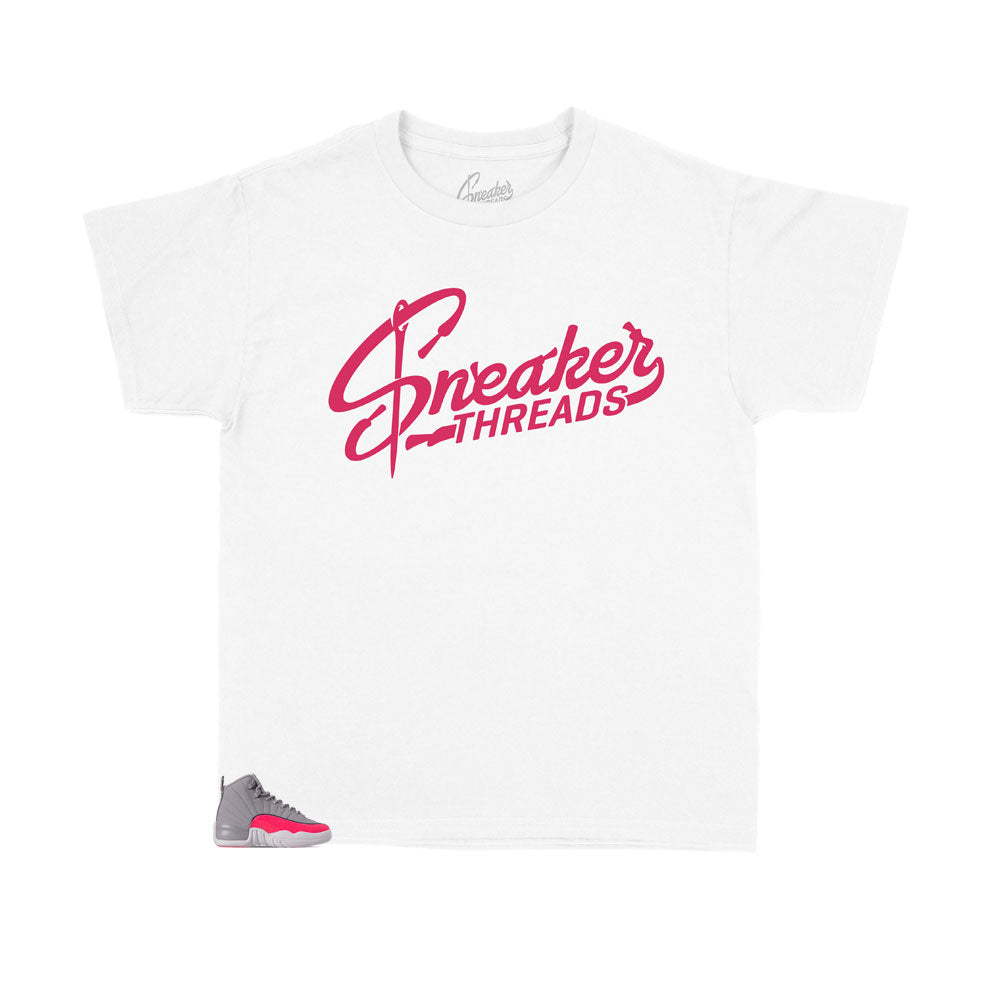 white and pink jordan shirt