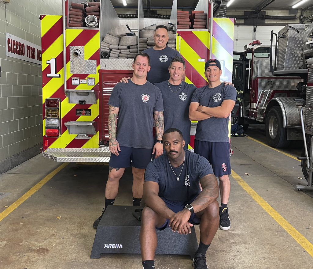 Cicero Fire Department team photo on an ARENA platform gym