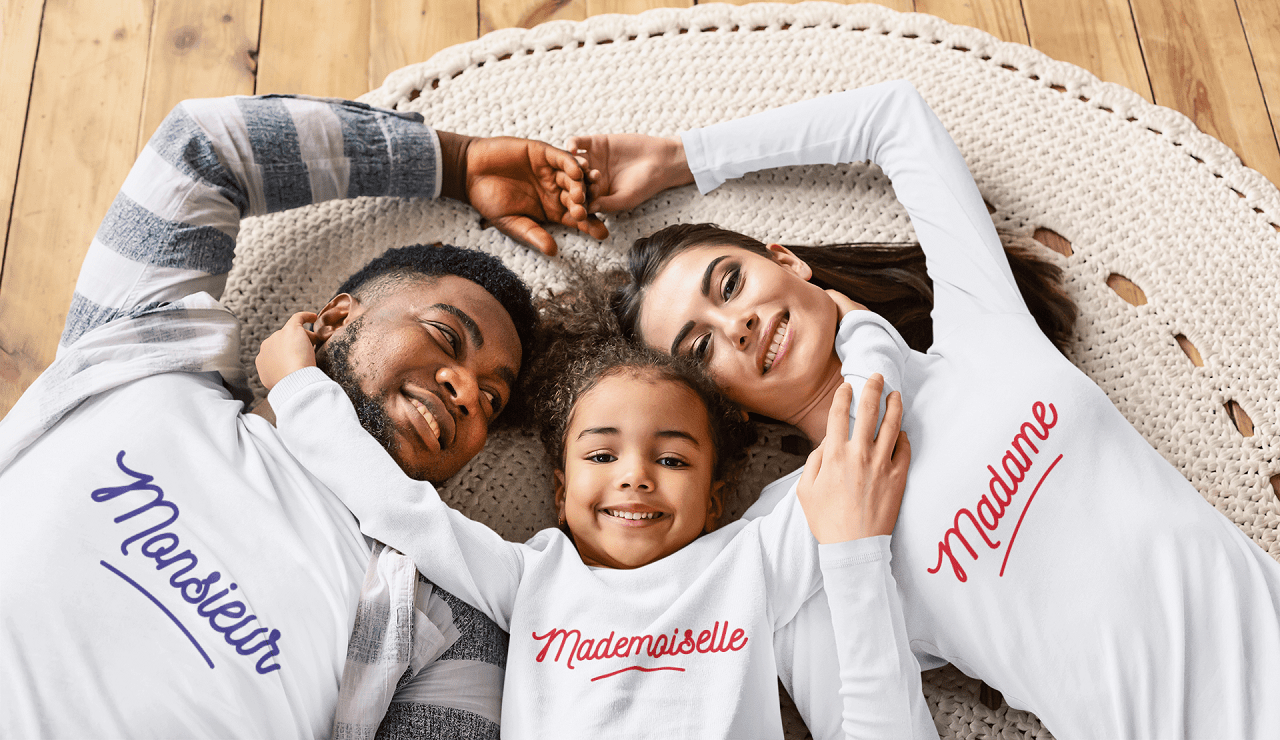 t-shirt mockup of a family of three lying together