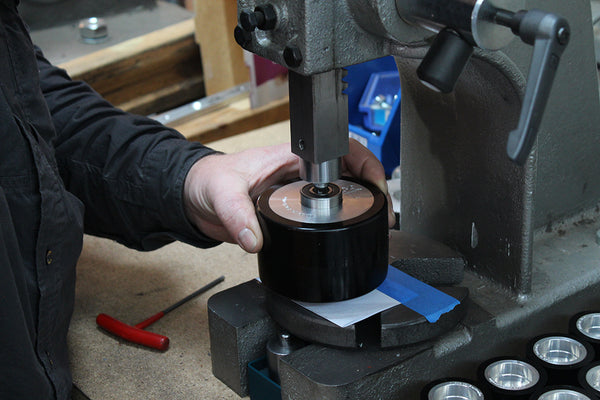 Bearing being pressed into contact wheel