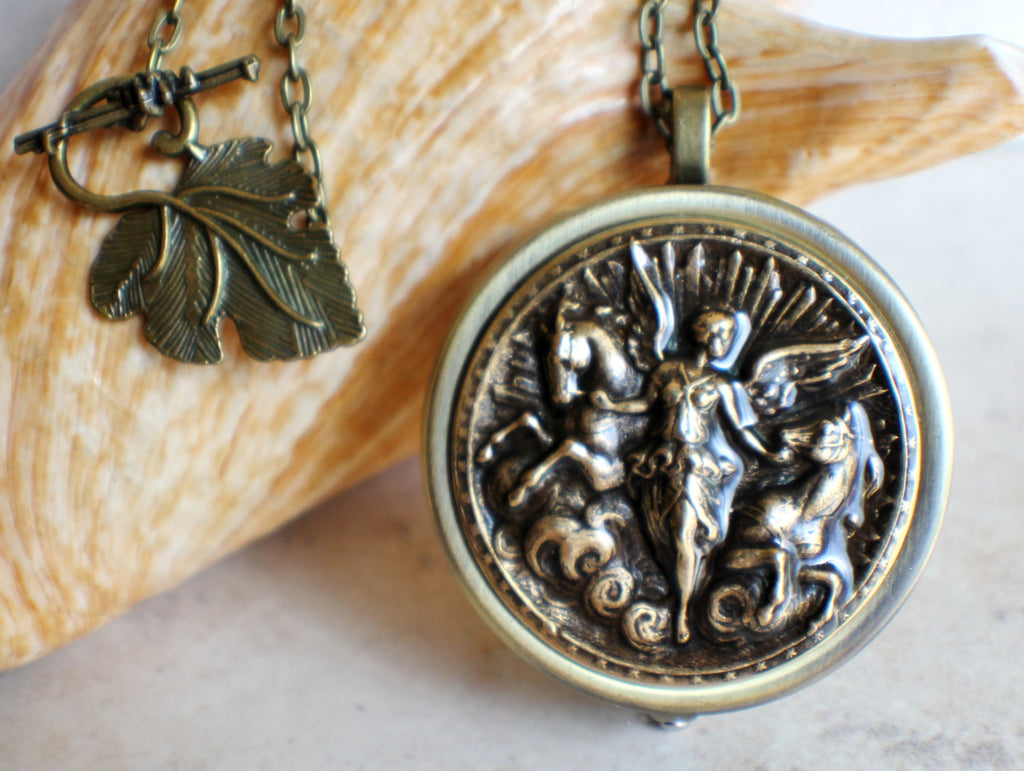 Angel and Horse Medalion Music Box Locket in Bronze. – Char's Favorite ...