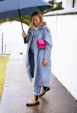 Pink suede clutch