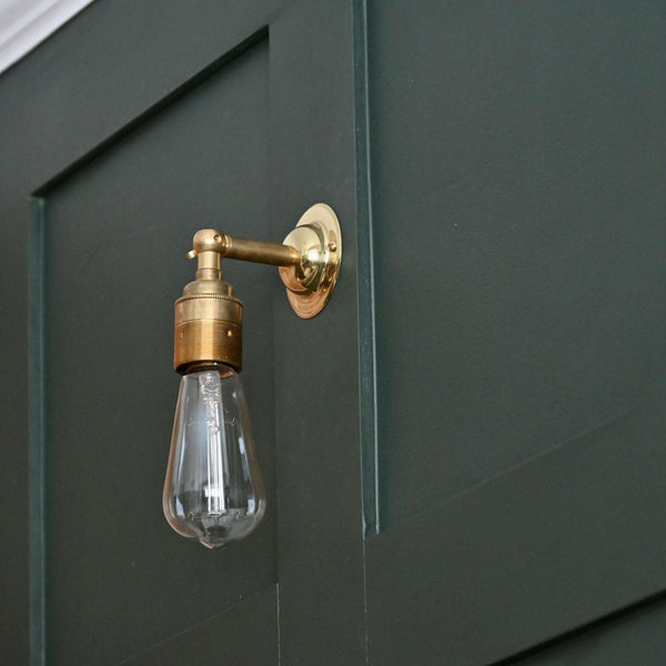 brass period wall light