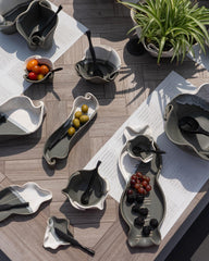 An array of Hilborn Pottery serving dishes