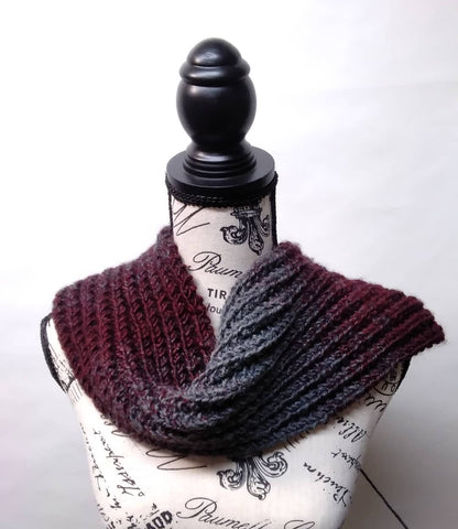 New scarf in Lion Brands Scarfie Yarn oxofrd/claret on Claire dressform image.