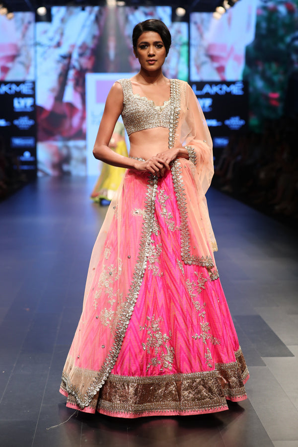 FRESH PINK TWO TONED LEHENGA SET WITH ALL OVER GOLD BUTIS AND A SEQUIN WORK  BLOUSE PAIRED WITH A MATCHING DUPATTA AND PALE GOLD DETAILS. - Seasons India