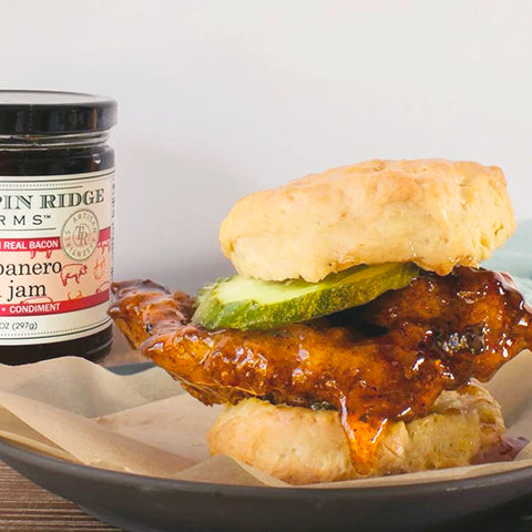 Fried chicken biscuit sandwich with hot pepper bacon glaze