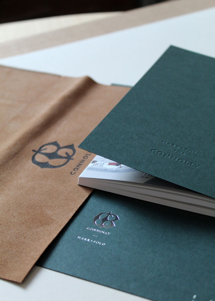 Connolly England logo on leather and forest green card, with custom bespoke notebooks by Mark+Fold