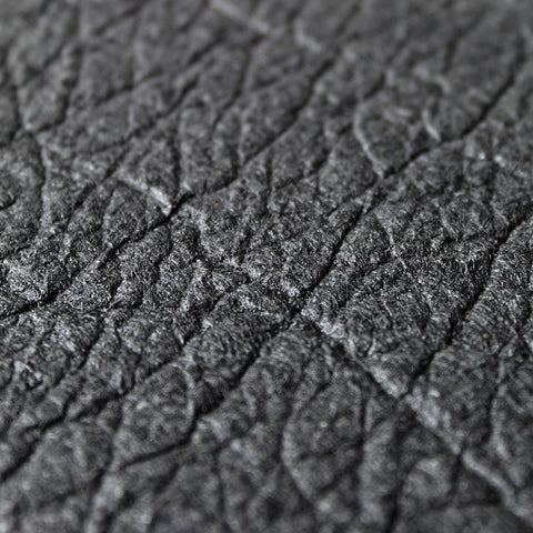 Close-up of pinatex material in black