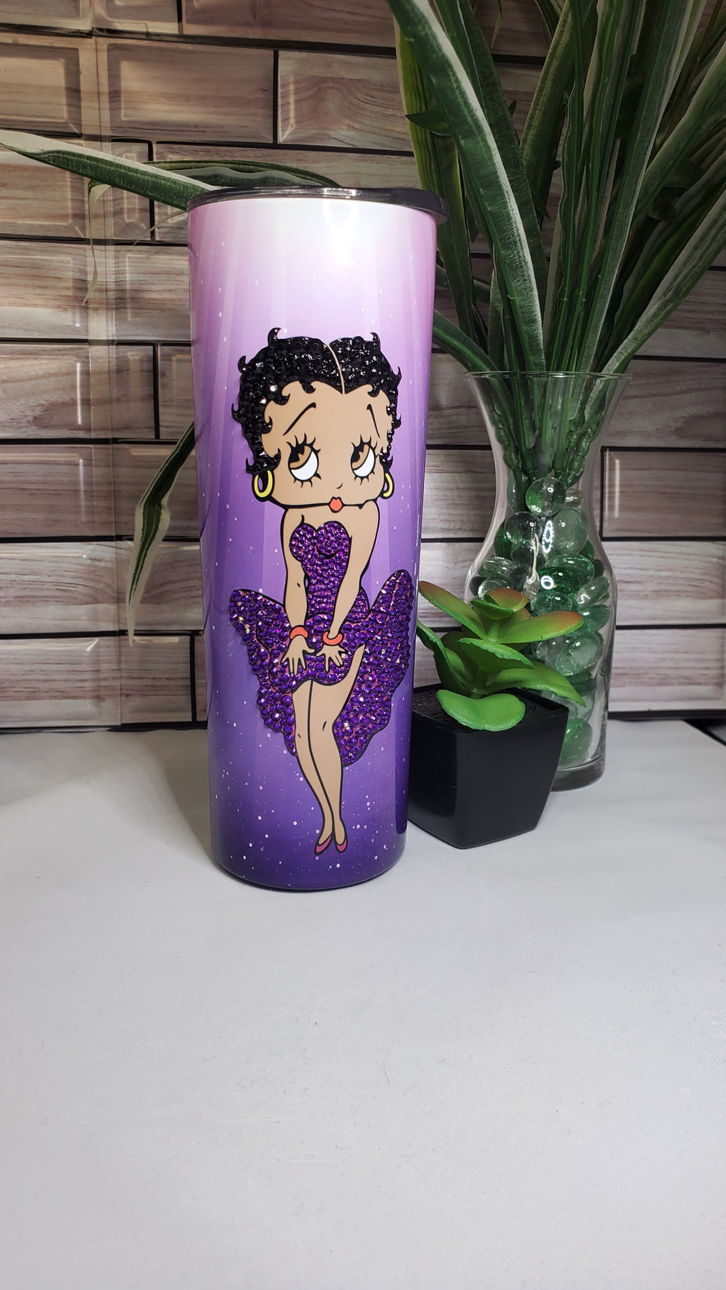 Custom Southern Tumblers - LV inspired tumbler made with Bright Pink glitter  that shimmers with hints of purple. Decal design done in Blue opal vinyl.  Snag this one while you can 🥰