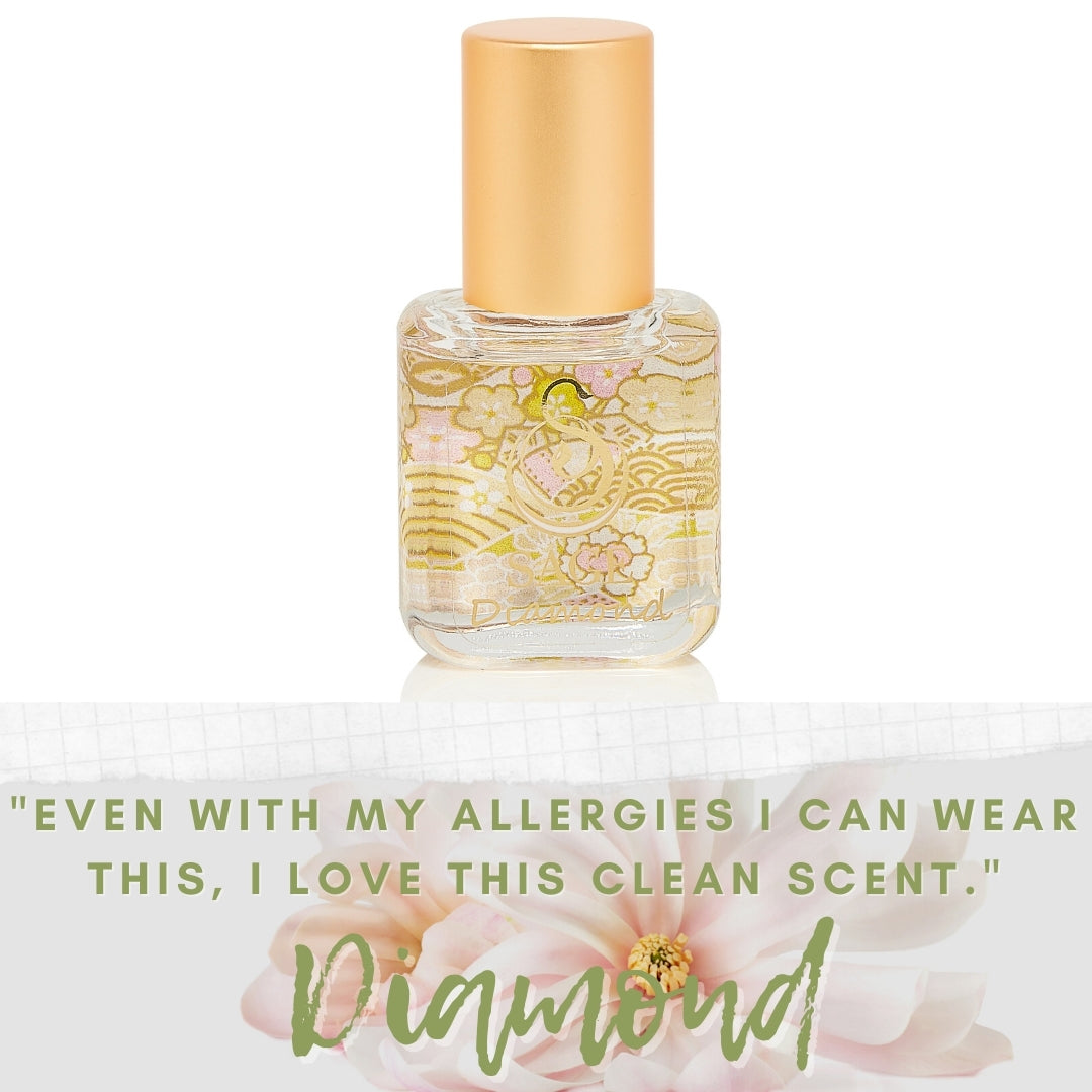 image of Diamond perfume extract glass bottle with words Even with my allergies I can wear this, I love this clean scent”.