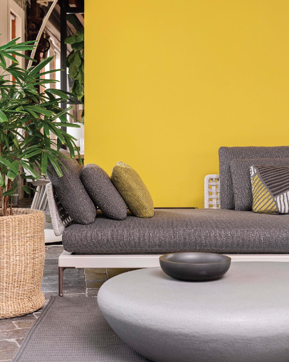 Patio seating system designed by GamFratesi, and Stony coffee table designed by Rodolfo Dordoni, featured in the Livingspace Showroom in Vancouver's Armoury District