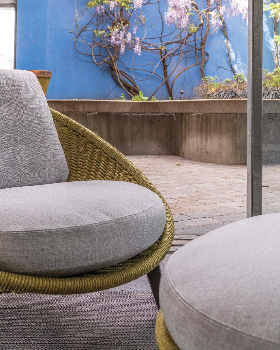 Lido “Cord” outdoor armchair and ottoman designed by GamFratesi, featured in the Livingspace Showroom in Vancouver's Armoury District