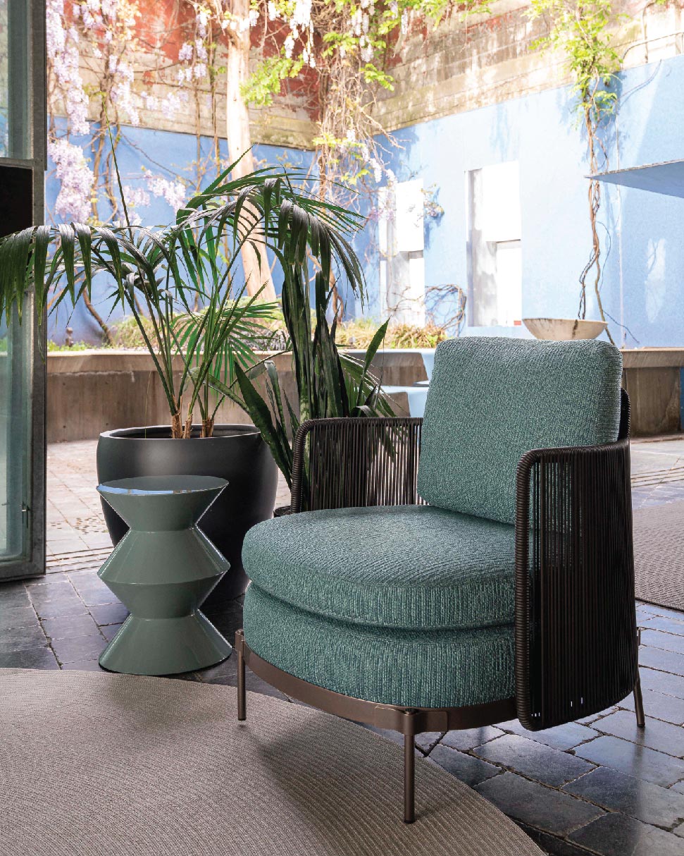 Tape “Cord” outdoor armchair designed by nendo, and Cesar outdoor coffee table designed by Rodolfo Dordoni, featured in the Livingspace Showroom in Vancouver's Armoury District
