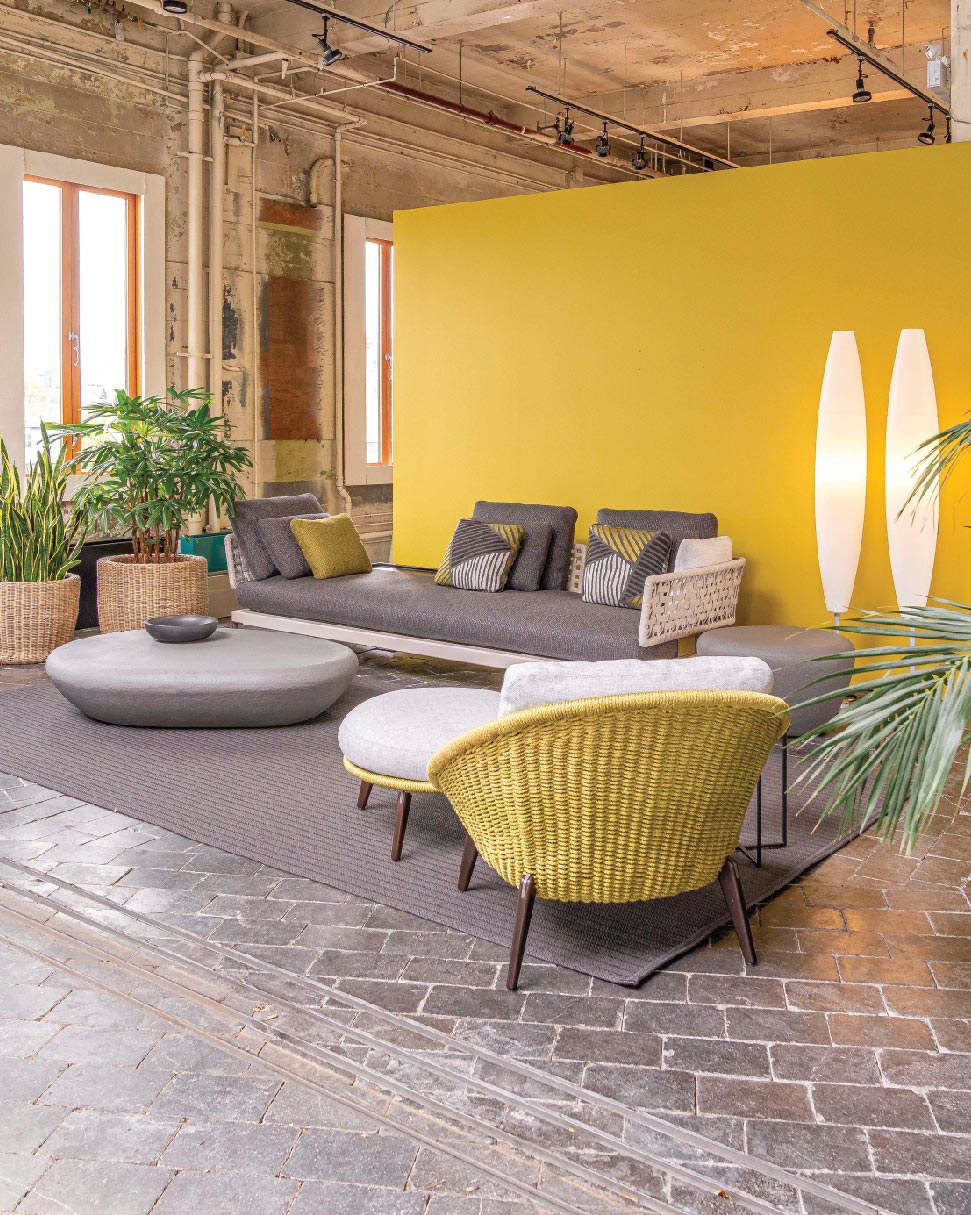 Patio seating system designed by GamFratesi, and Stony coffee table designed by Rodolfo Dordoni, featured in the Livingspace Showroom in Vancouver's Armoury District