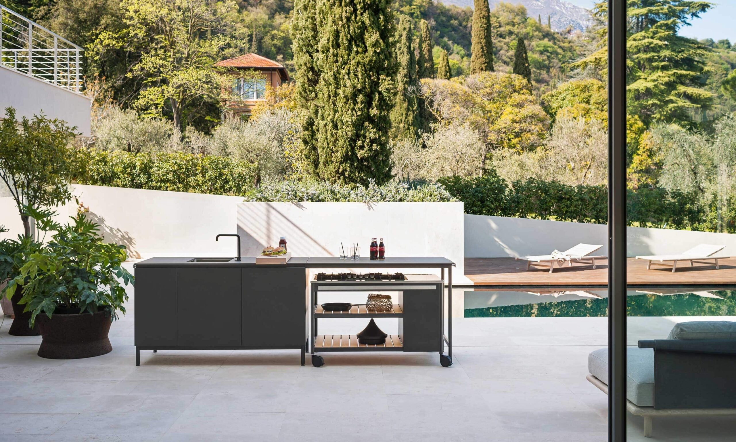 Complete NORMA outdoor kitchen from RODA, including freestanding island module.