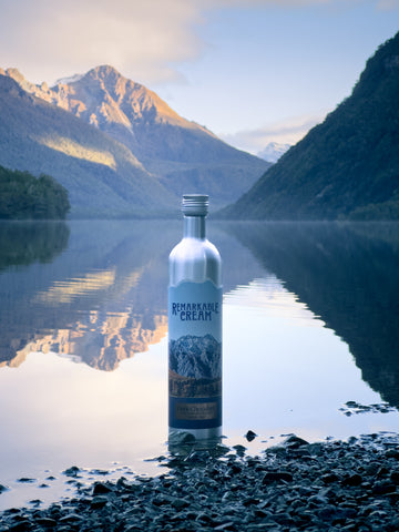 New Zealand cream liqueur with wakatipu background mirror lake
