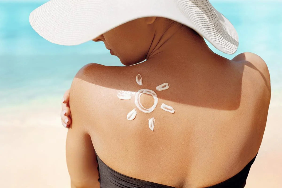 A fashionable girl wearing a chic hat as a stylish shield against sun damage, showcasing smart sun protection in a single captivating image.