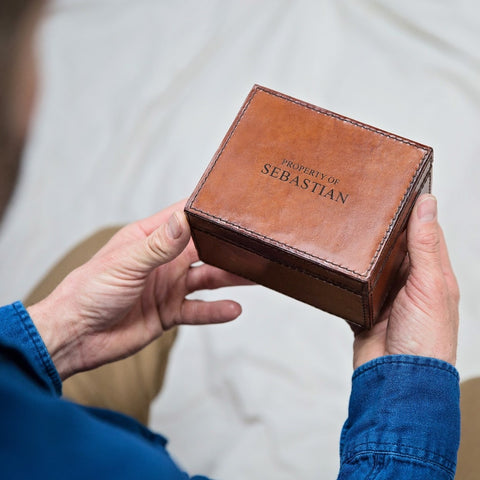 personalised leather stud box with property of Sebastian engraved on the lid