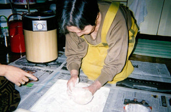 Kazy's mother in law making mochi for New Years.jpg__PID:59a5d3e2-2111-4414-ad45-64744b2b8433