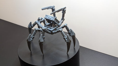 a 3D printed model of an alien mechanical spider
