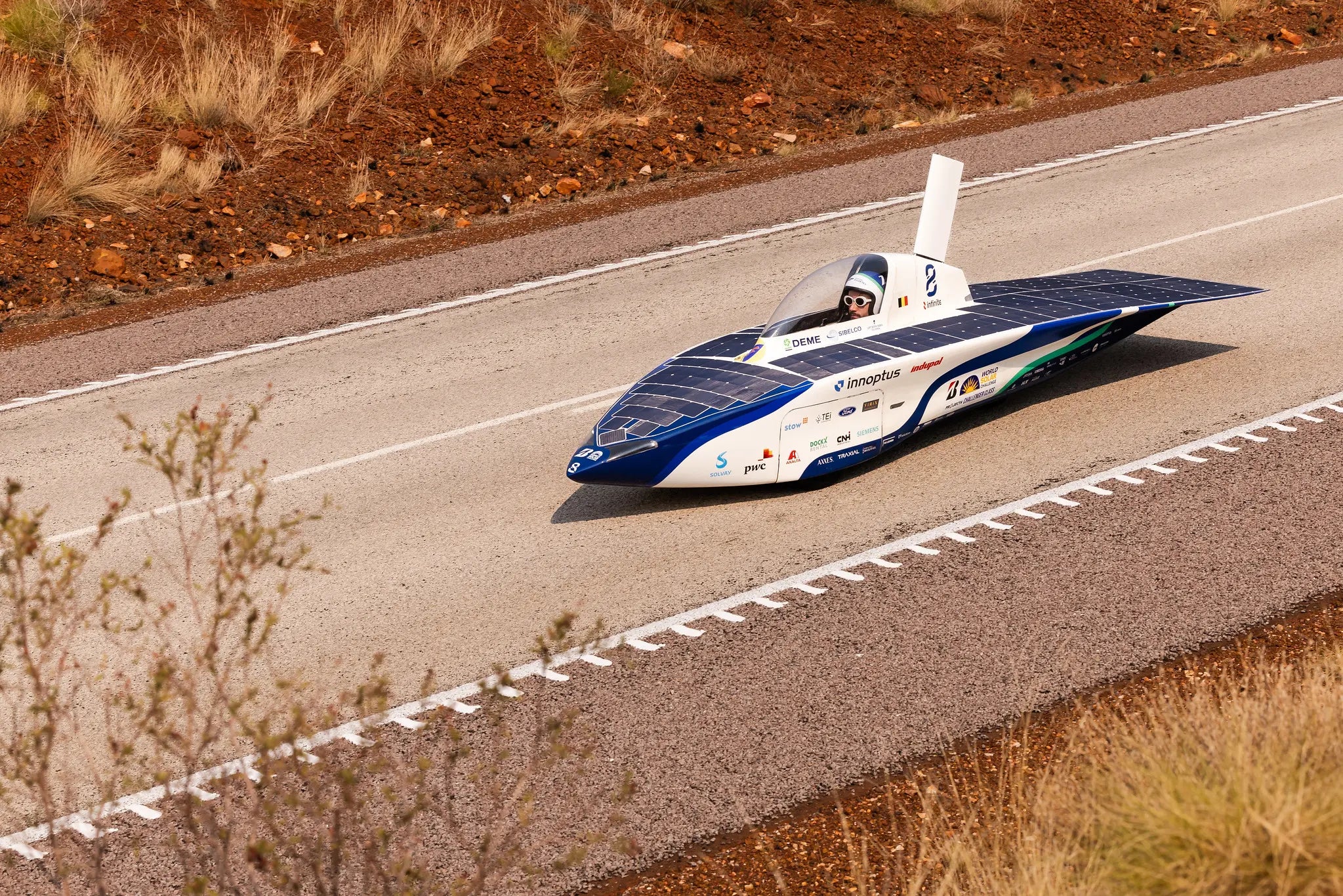 Infinite solar car crossing through the Australian desert