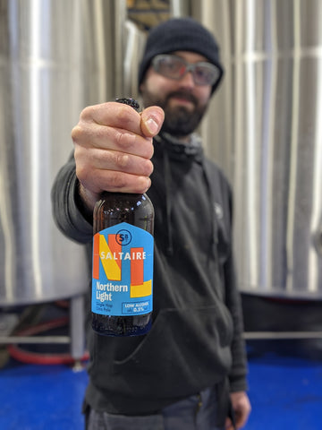 Saltaire's development brewer Rob Cooke with a bottle of Northern Light 