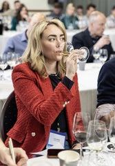 Lucy Dallyn tasting wine