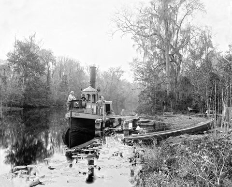 A black and white photograph of a boat on Rice Creek
