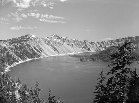 A black and white photograph of Crater Lake