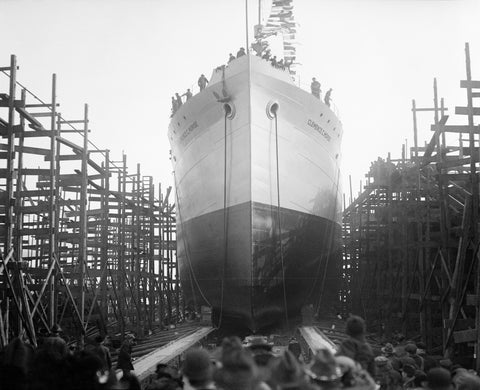 A black and white photograph of a ship being launched from a Virginia port