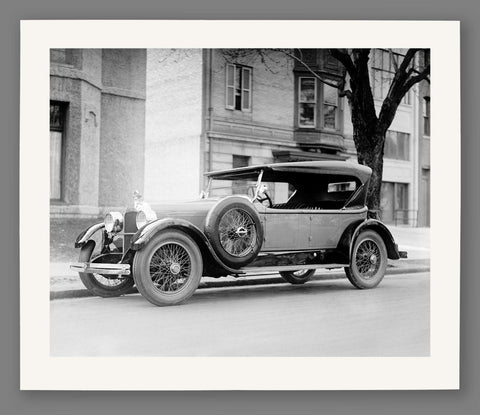 A fine art paper print of vintage photography featuring a Dusenberg Car