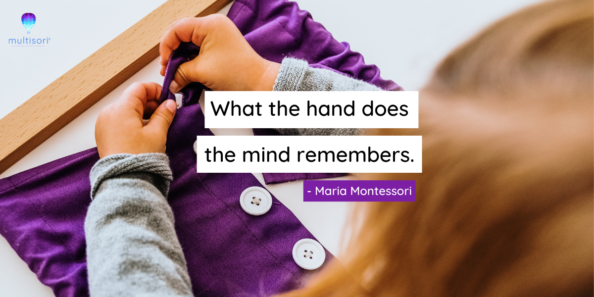 Maria Montessori practical life quote, background is toddler using Montessori dressing frames with text overlay quote that says “What the hand does, the mind remembers. - Maria Montessori”