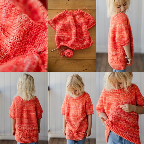 A girl models a vivid orange and pink handspun and knit sweater