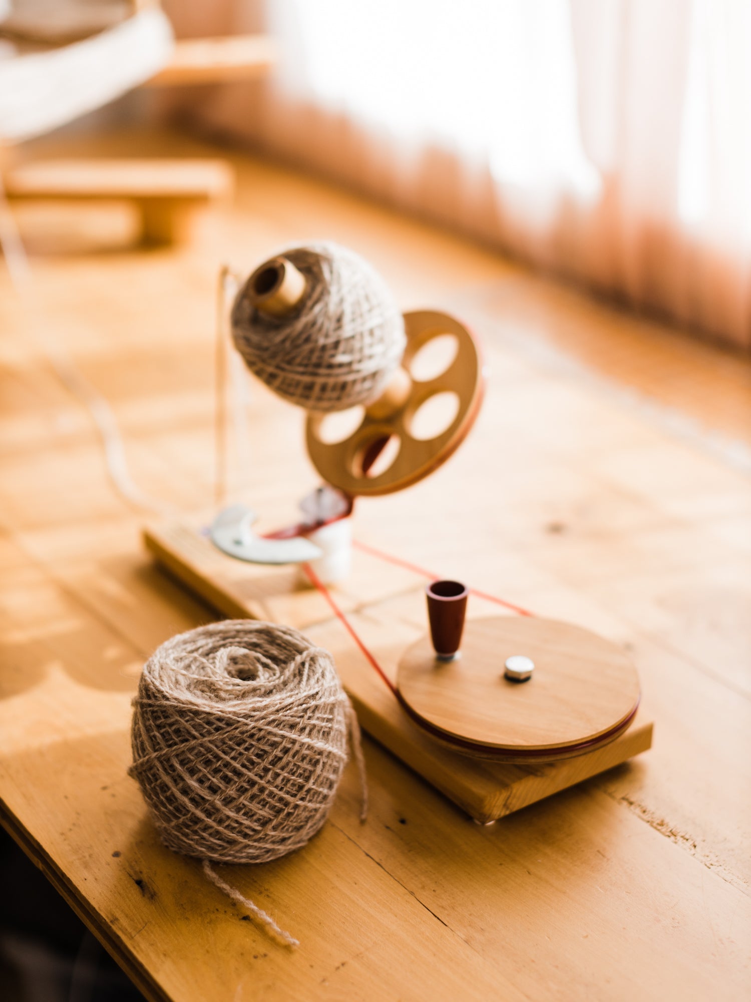 This Darling Home Handspun yarn wound on a ball winder