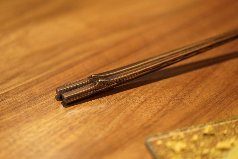 showing off the fatter ends of the chopsticks