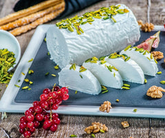 Sliced goat cheese log