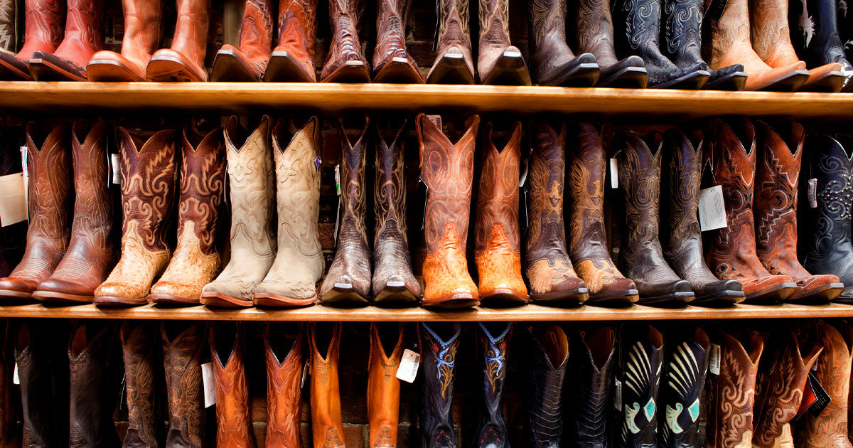 Multiple rows of cowboy boots