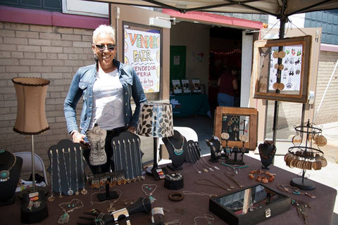 Stephanie Whitfield displays items from her business