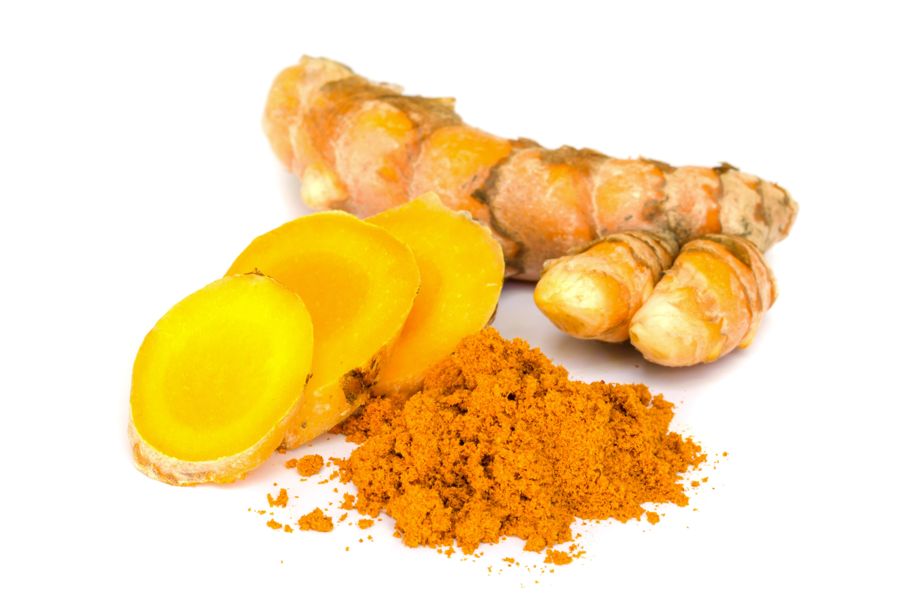 Fresh turmeric root, sliced pieces, and ground powder against a white background.