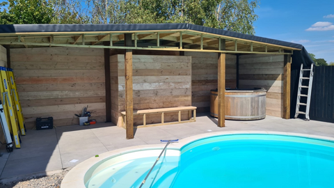 scaffold boards used for cladding an outdoor barn