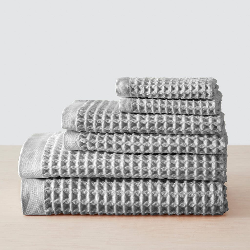 gray and white hand towels