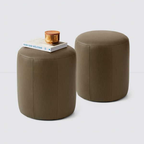 https://cdn.shopify.com/s/files/1/0438/1069/products/Torres_Round_Ottoman_Olive_Small_5_600x600.jpg?v=1687274497